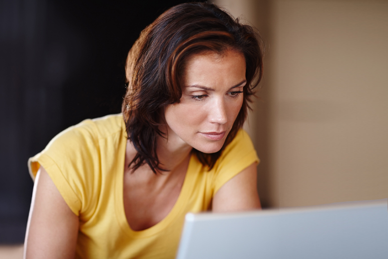 A consumer looking at her laptop